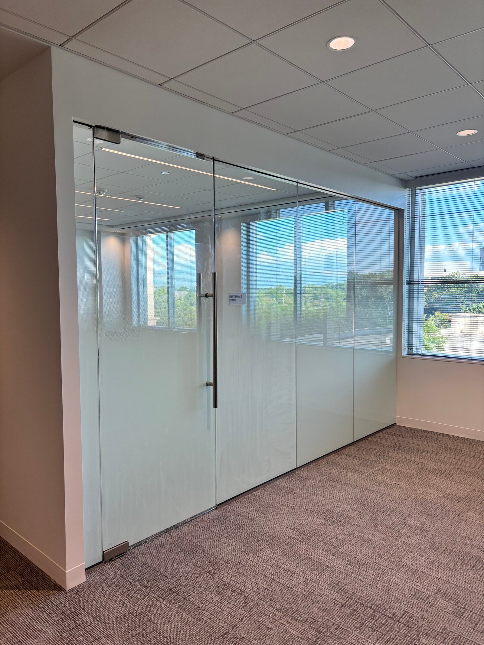 Frosted privacy film on office glass panels